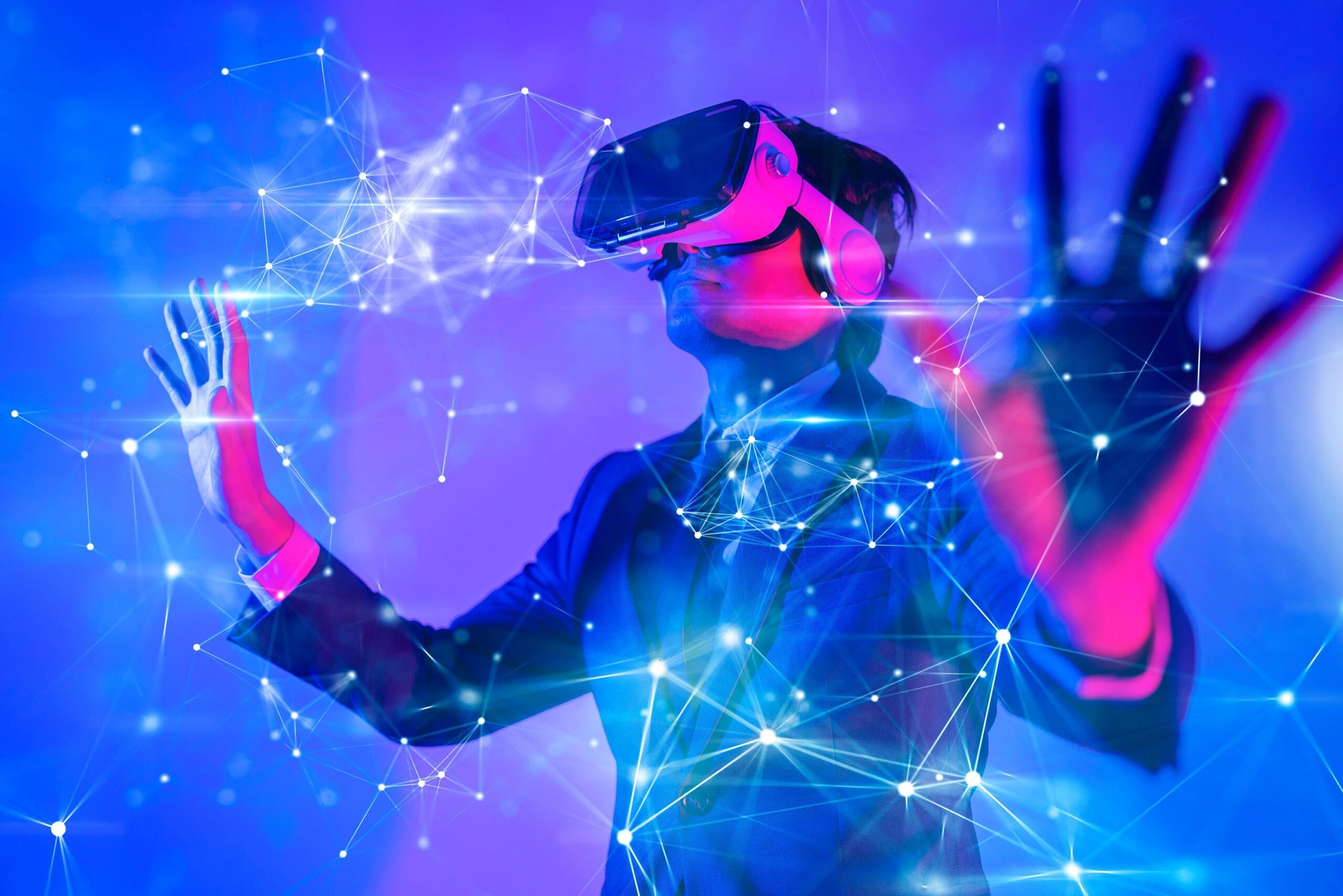 Person in VR headset interacting with glowing digital network interface in futuristic blue-pink lighting
